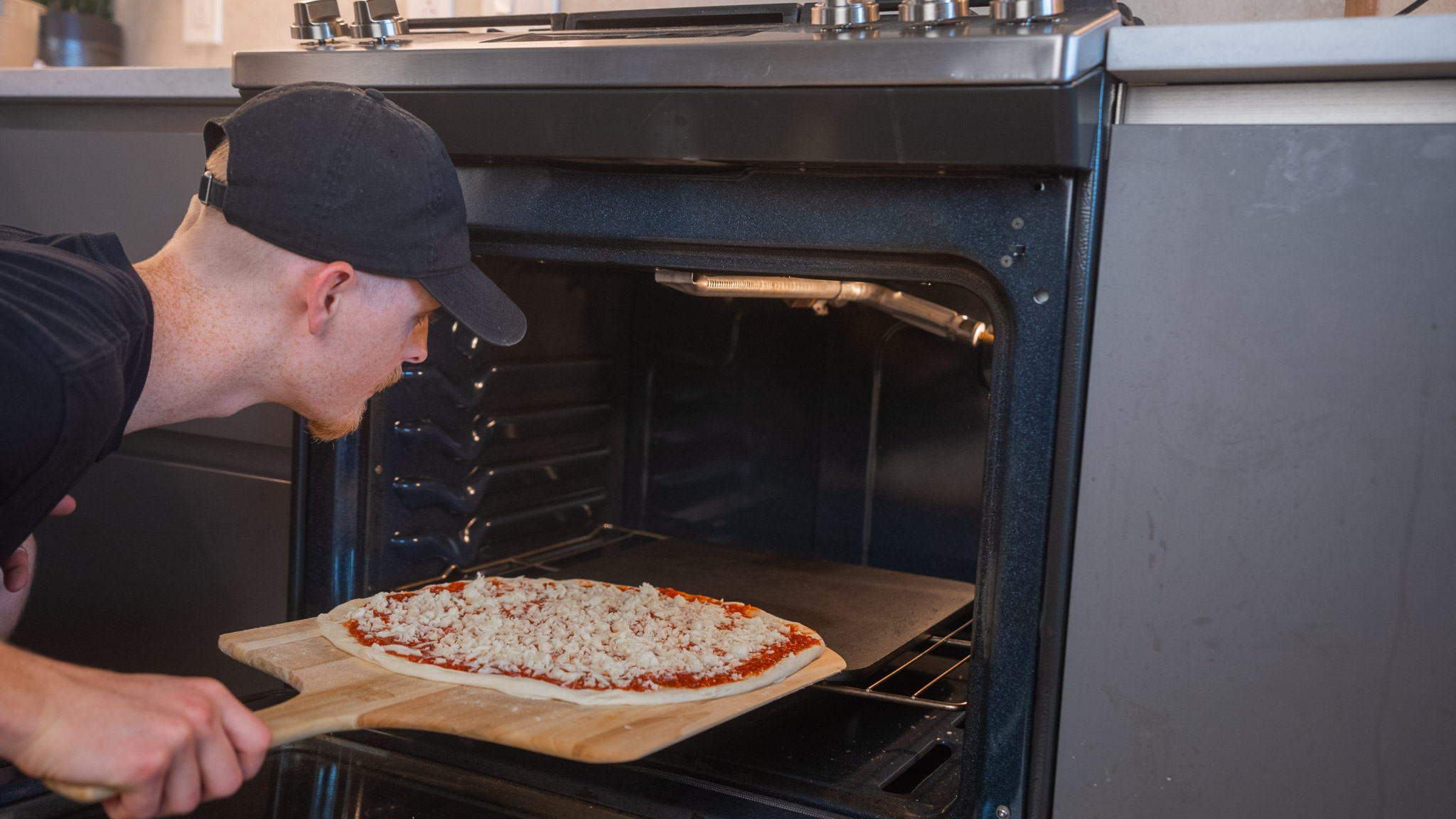 Launching a pizza into the oven