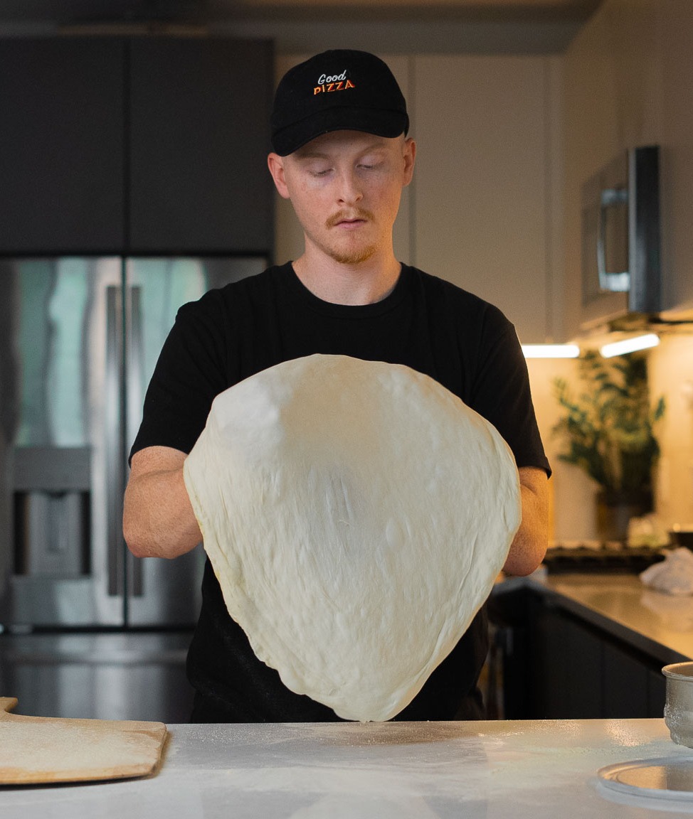 Stretching pizza dough